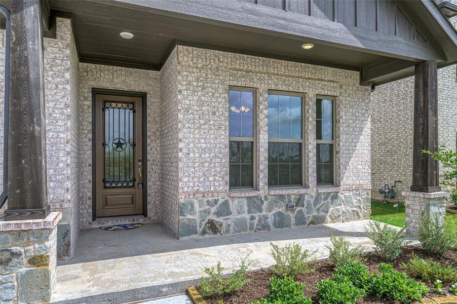 Exterior details and patio area of a home in Stone River Glen, Royse City (Image 3).