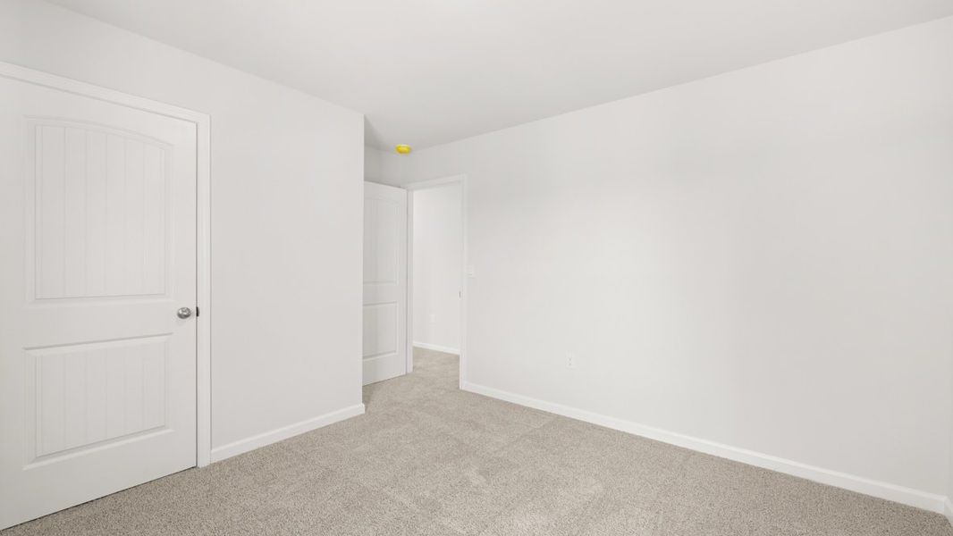 Representative unfurnished interior of a home built from the Hayden by D.R. Horton in Liberty Crossing, Braselton (Image 27).