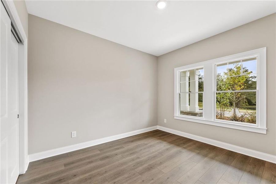 Spacious, unfurnished interior of a new home in The Courtyards at Bailey Farms, Dacula (Image 29).