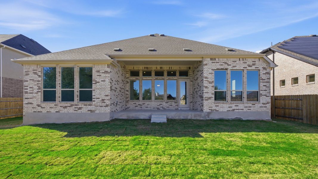 Exterior details and patio area of a home in Oaks at San Gabriel, Georgetown (Image 3).