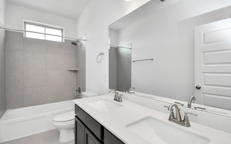 Furnished interior view inside a new home in Elyson, Katy (Image 9).