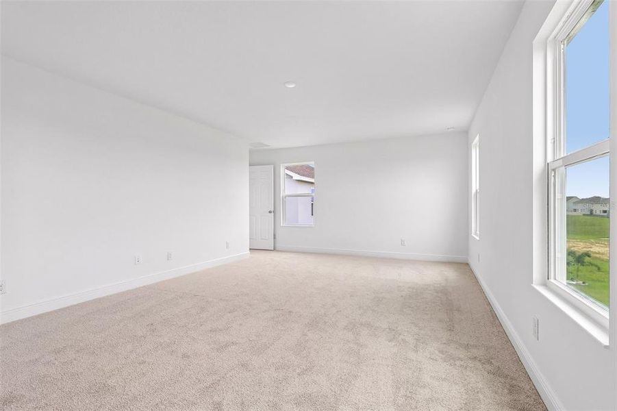 Spacious, unfurnished interior of a new home in Park View at the Hills, Minneola (Image 22).