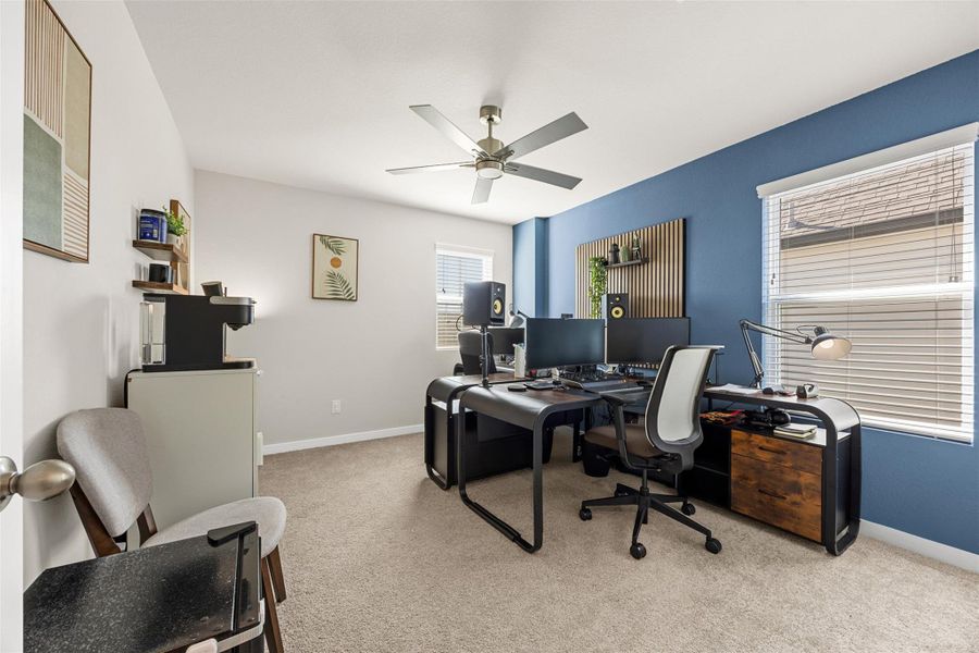Furnished interior view inside a new home in Sunterra, Katy (Image 9).