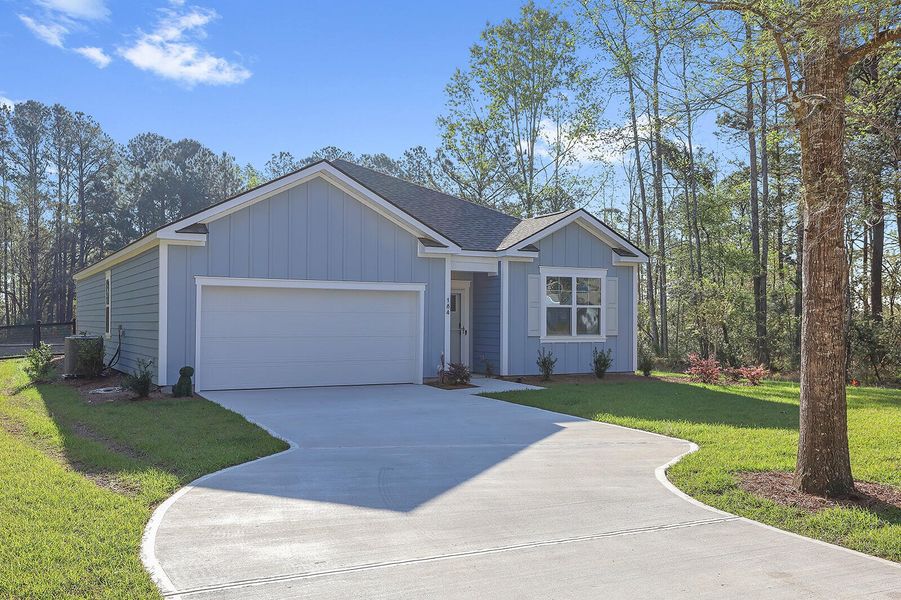 Front exterior of a new home in Rivers Reach, Yemassee, SC, highlighting curb appeal (Image 1). Front exterior of a new home in Rivers Reach, Yemassee, SC, highlighting curb appeal (Image 1).