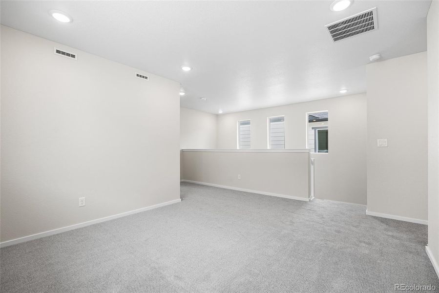 Spacious, unfurnished interior of a new home in Barefoot Village, Firestone (Image 16).