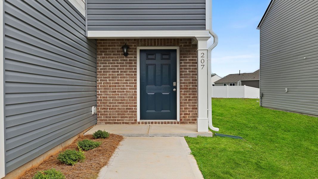 Exterior details and patio area of a home in Harrier Point, Woodruff (Image 3).