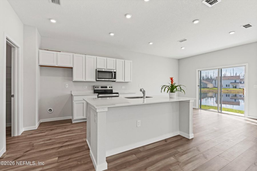 Furnished interior view inside a new home in The Landings at Pecan Park, Jacksonville (Image 4). Furnished interior view inside a new home in The Landings at Pecan Park, Jacksonville (Image 4).