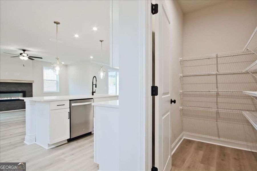 Furnished interior view inside a new home in The Paddocks at Doc Hughes, Buford (Image 28).