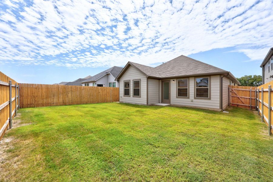 Exterior details and patio area of a home in Trinity Ranch, Elgin (Image 20).