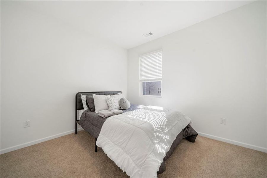 Furnished interior view inside a new home in Brooks Village, Dacula (Image 9).