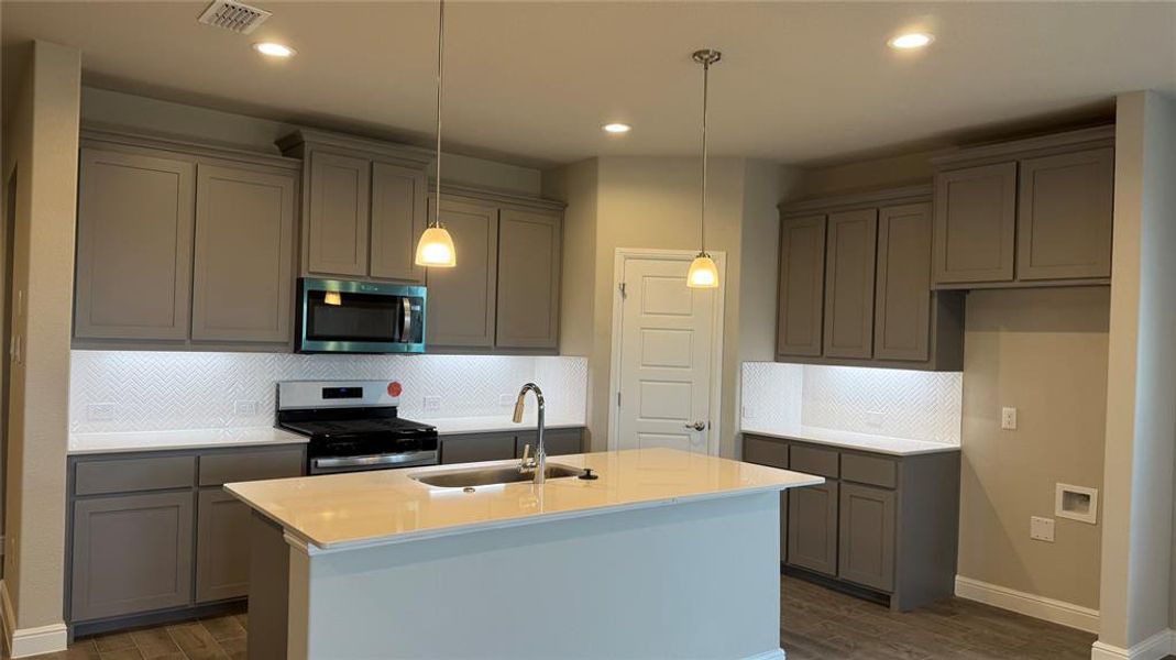 Kitchen - All Home and community information, including pricing, included features, terms, availability and amenities, are subject to change at any time without notice or obligation. All Drawings, pictures, photographs, video, square footages, floor plans, elevations, features, colors and sizes are approximate for illustration purposes only and will vary from the homes as built. Kitchen - All Home and community information, including pricing, included features, terms, availability and amenities, are subject to change at any time without notice or obligation. All Drawings, pictures, photographs, video, square footages, floor plans, elevations, features, colors and sizes are approximate for illustration purposes only and will vary from the homes as built.