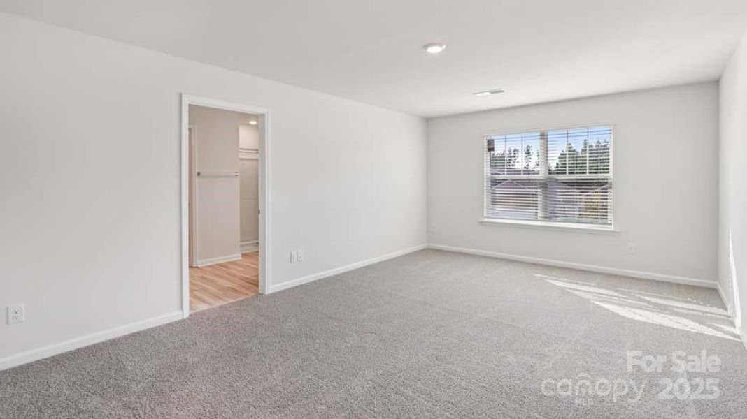 Spacious, unfurnished interior of a new home in Wallace Springs, Statesville (Image 14).