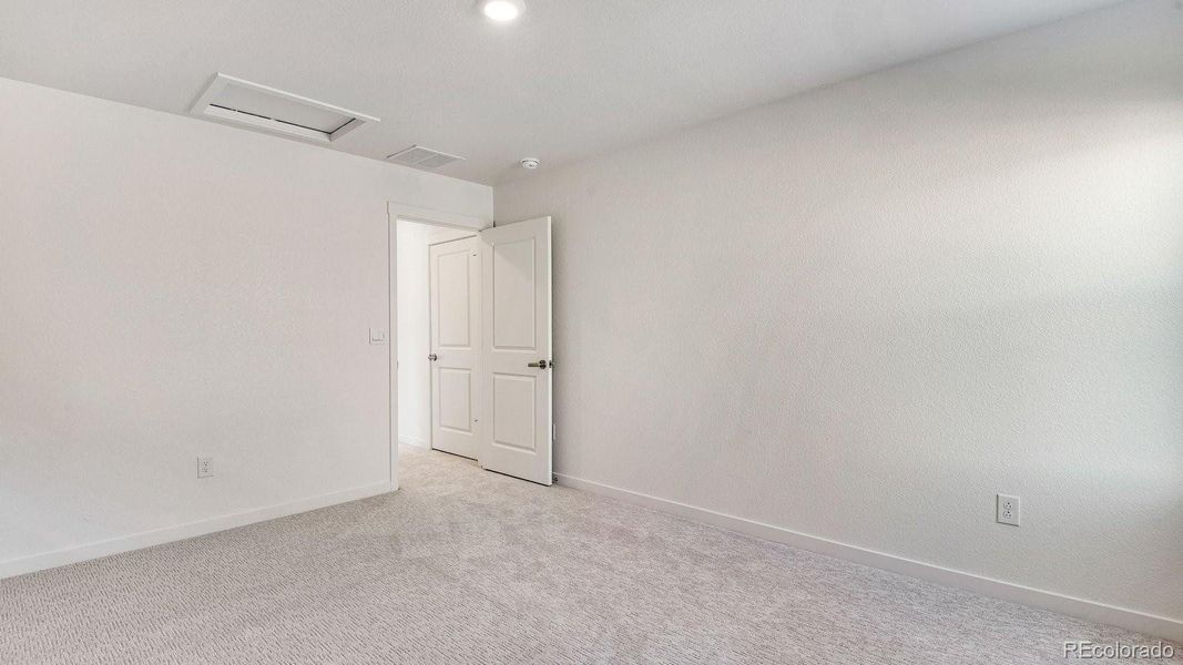 Spacious, unfurnished interior of a new home in Trails at Crowfoot, Parker (Image 35).