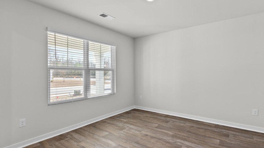 Spacious, unfurnished interior of a new home in Cedar Hill Landing, Navassa (Image 16). Spacious, unfurnished interior of a new home in Cedar Hill Landing, Navassa (Image 16).