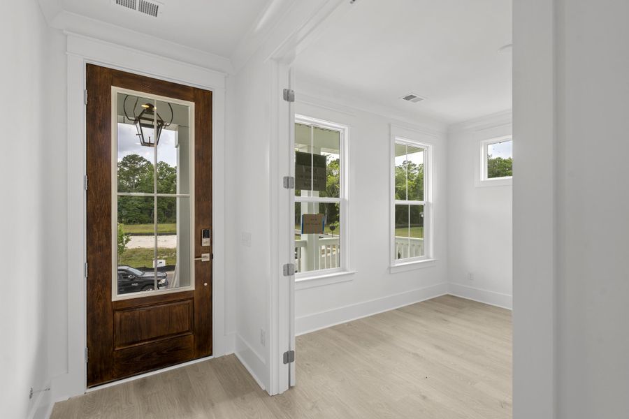 Spacious, unfurnished interior of a new home in Miller's Crossing, Johns Island (Image 14). Spacious, unfurnished interior of a new home in Miller's Crossing, Johns Island (Image 14).