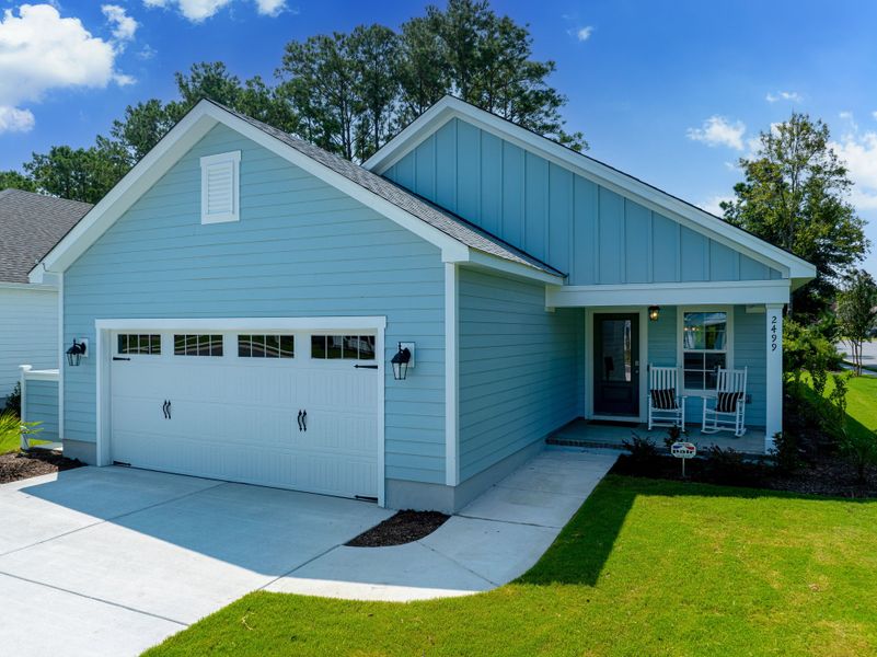 Front exterior of a new home in Osprey Landing, Southport, NC, highlighting curb appeal (Image 2).