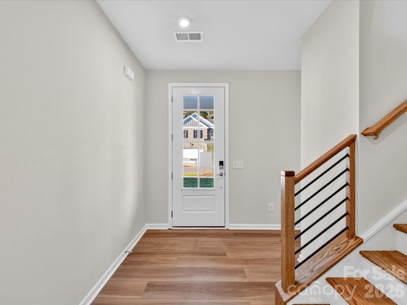 Front Entry with Open Rail Detail Adding Design Interest. Front Entry with Open Rail Detail Adding Design Interest.