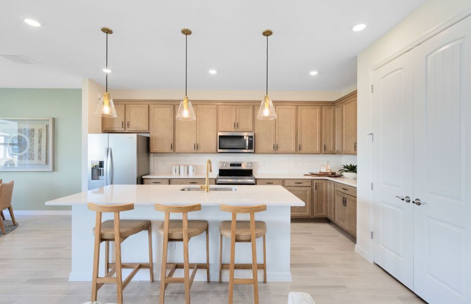 Representative furnished interior of a home built from the Concord by DiVosta in Emerson Oaks, Vero Beach (Image 9).