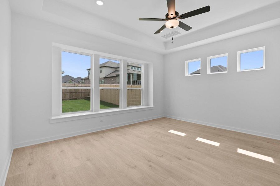 Primary Bedroom with tray ceiling Primary Bedroom with tray ceiling