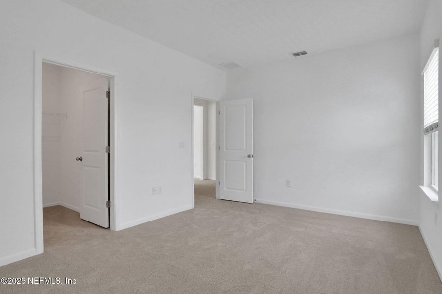 Spacious, unfurnished interior of a new home in TrailMark, St. Augustine (Image 40).