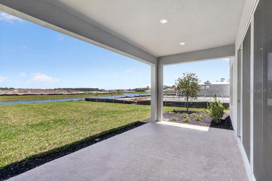 Exterior details and patio area of a home in Ardisia Park, New Smyrna Beach (Image 3).
