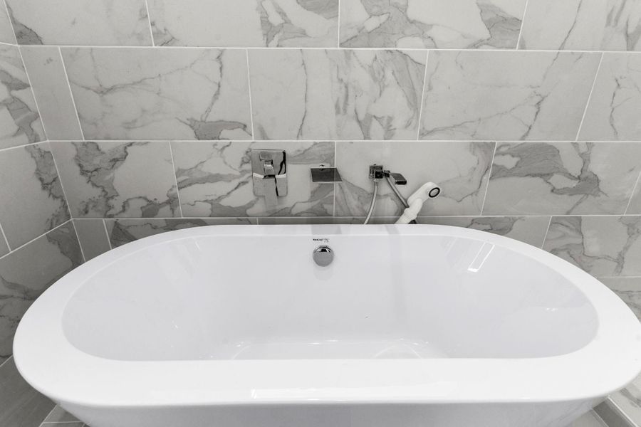 Relax after a long day in this elegant soaking tub. Relax after a long day in this elegant soaking tub.