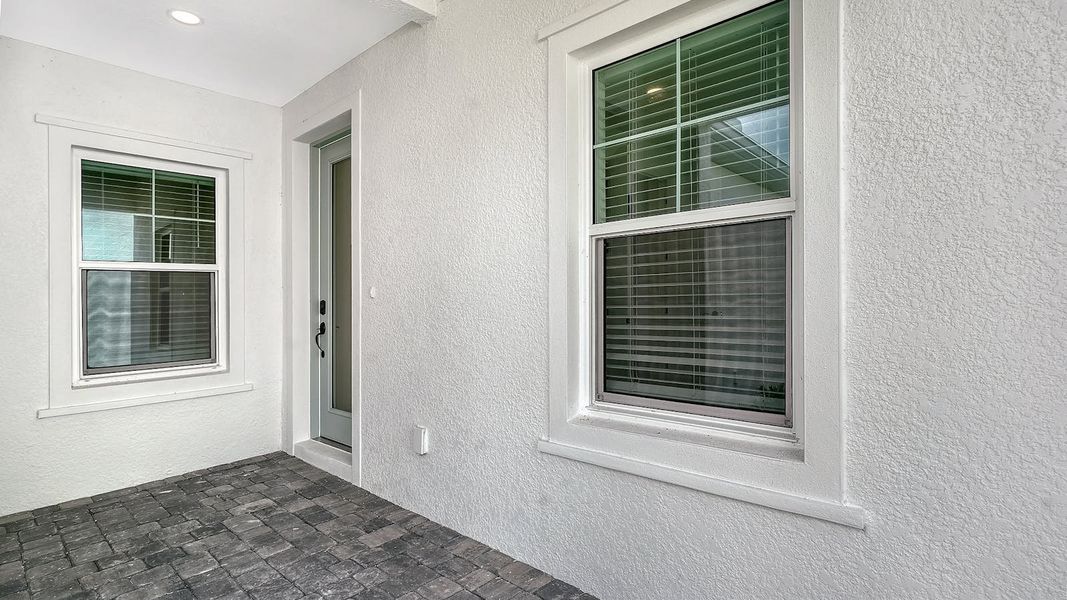 Exterior details and patio area of a home in Windward Real Estate and Homes for Sale in Sarasota, FL - Neal Communities, Lakewood Ranch (Image 20).