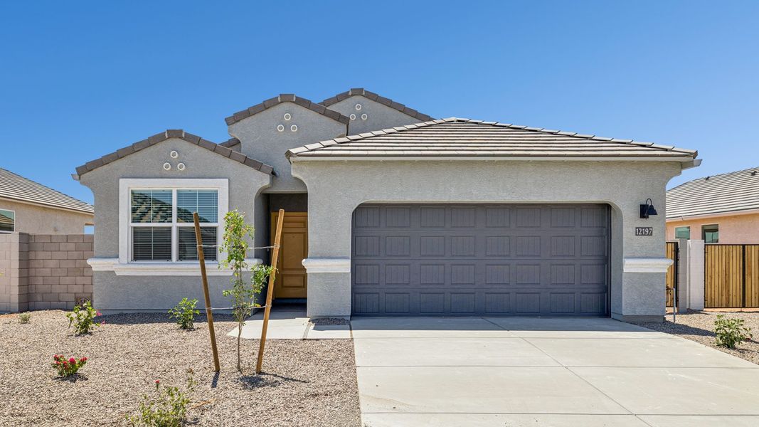 Representative exterior photo of a completed home built from the Raven by D.R. Horton in Magma Ranch Vistas, Florence, AZ (Image 19).