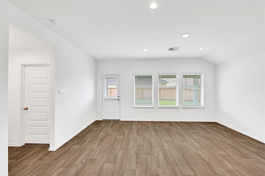 Large windows throughout the home are fitted with shutters, allowing you to seamlessly enjoy the outdoor views while maintaining privacy whenever needed.