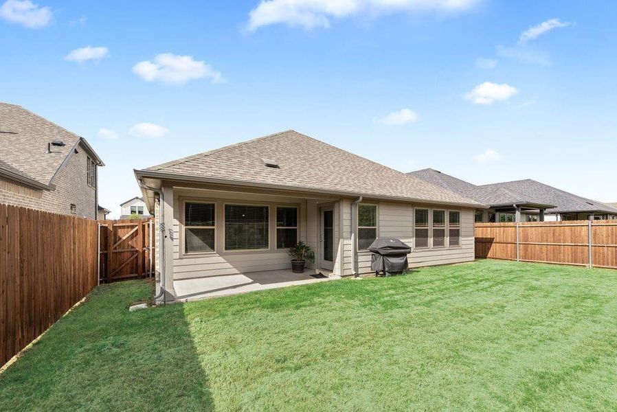 Exterior details and patio area of a home in Tesoro at Chisholm Trail Ranch, Crowley (Image 4).