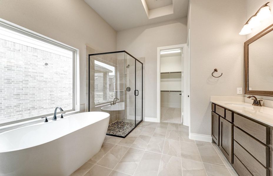 Furnished interior view inside a new home in The Woodlands Hills 65′, Willis (Image 19).
