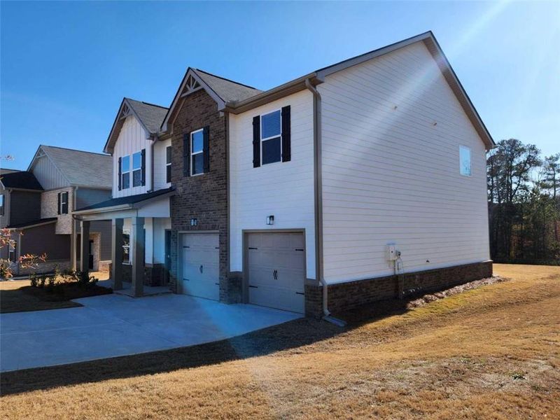 Exterior details and patio area of a home in Southern Hills, McDonough (Image 4).