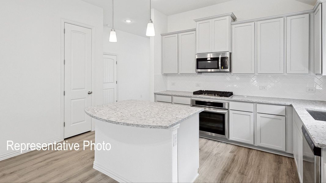 Furnished interior view inside a new home in Green Meadows Premier, Celina (Image 5).
