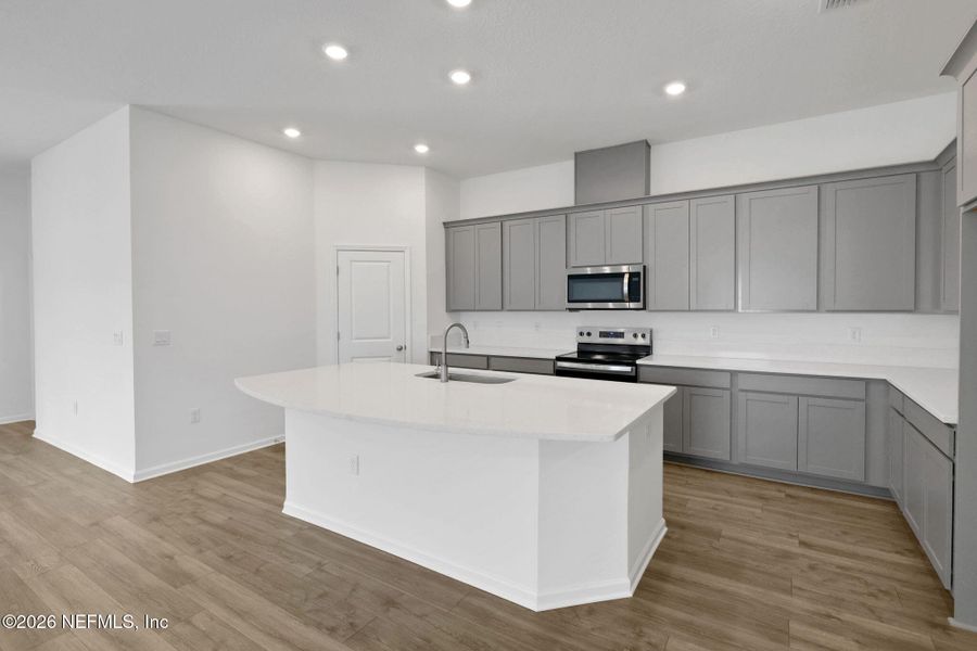 Furnished interior view inside a new home in Amberly, Green Cove Springs (Image 5).