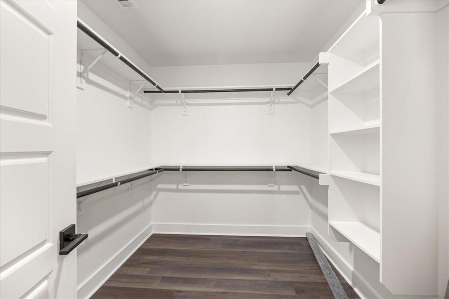 GIANT walk in closet in the primary. GIANT walk in closet in the primary.