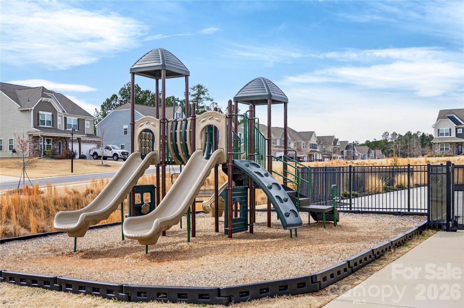 Playground area outside the fenced pool.