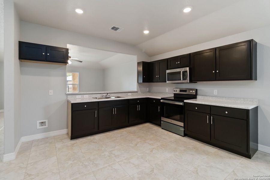 Furnished interior view inside a new home in , San Antonio (Image 4).