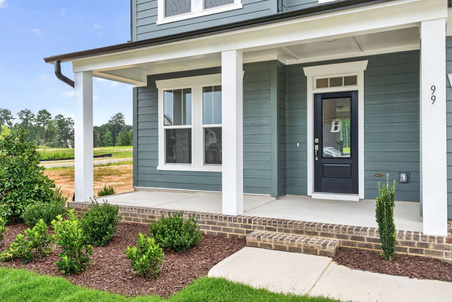 Exterior details and patio area of a home in Serenity - The Village Collection, Fuquay Varina (Image 4).