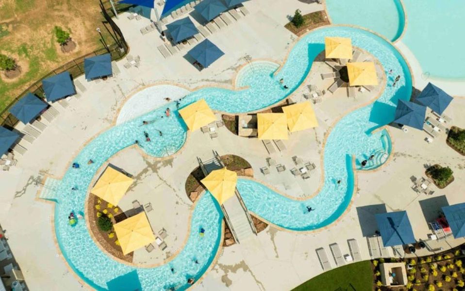 Sunterra residents can float their cares away at The Retreat, an amenity complex anchored by a resort-style pool and lazy river. Other features within The Retreat include a clubhouse with a resident lounge, kids zone, hospitality area, conference area, office for Sunterra’s lifestyle director and more. A yoga studio, event lawn, fitness center and open-air arcade add to the fun on the horizon at The Retreat. Sunterra residents can float their cares away at The Retreat, an amenity complex anchored by a resort-style pool and lazy river. Other features within The Retreat include a clubhouse with a resident lounge, kids zone, hospitality area, conference area, office for Sunterra’s lifestyle director and more. A yoga studio, event lawn, fitness center and open-air arcade add to the fun on the horizon at The Retreat.