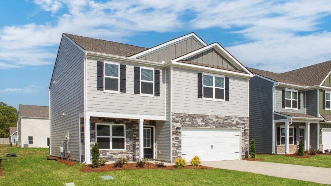 Front exterior of a new home in The Cove at Thrasher Landing, Hixson, TN, highlighting curb appeal (Image 2).