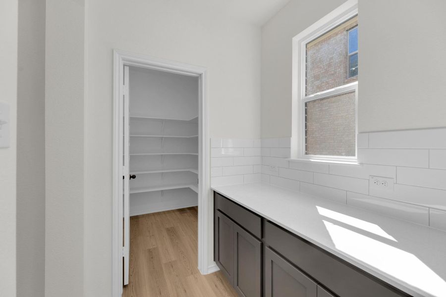 Furnished interior view inside a new home in Salerno - Classic Collection, Round Rock (Image 9). Furnished interior view inside a new home in Salerno - Classic Collection, Round Rock (Image 9).