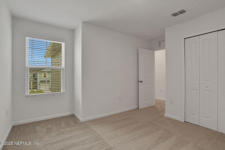 Spacious, unfurnished interior of a new home in Atlantis Pointe, Middleburg (Image 19).