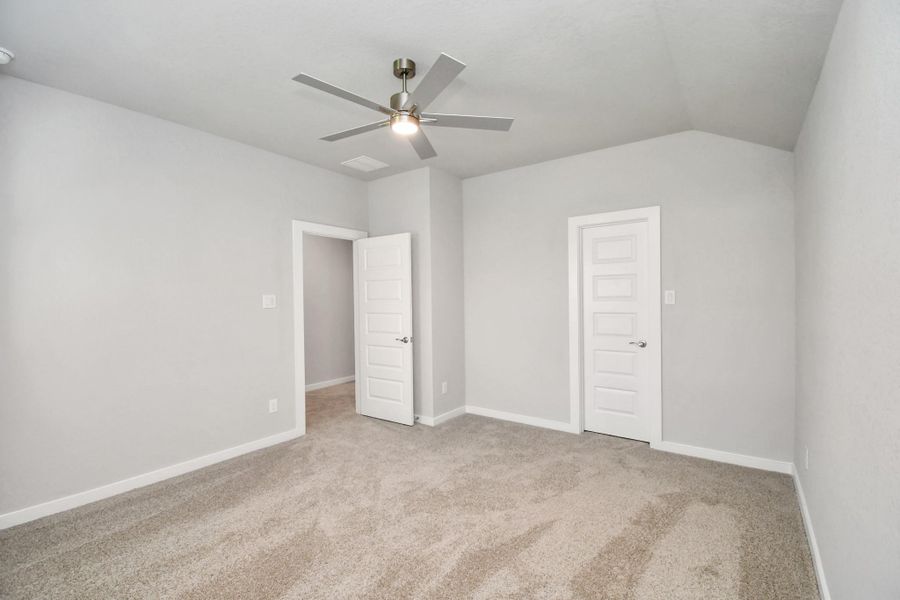 Generously sized secondary bedrooms featuring spacious closets, soft and inviting carpeting underfoot, large windows allowing plenty of natural light, and the added touch of privacy blinds for your personal retreat. Sample photo of completed home with similar floor plan. Actual colors and selections may vary. Generously sized secondary bedrooms featuring spacious closets, soft and inviting carpeting underfoot, large windows allowing plenty of natural light, and the added touch of privacy blinds for your personal retreat. Sample photo of completed home with similar floor plan. Actual colors and selections may vary.