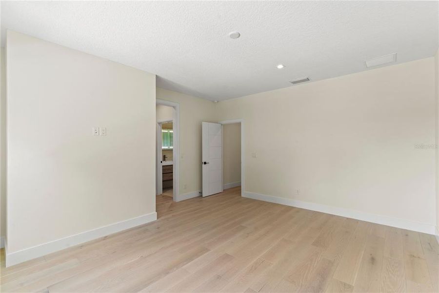 Bedroom 2 with en suite bathroom and walk-in closet Bedroom 2 with en suite bathroom and walk-in closet