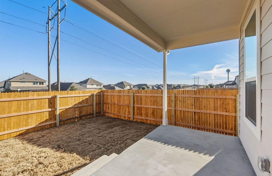 Exterior details and patio area of a home in Crosswinds, Kyle (Image 22).