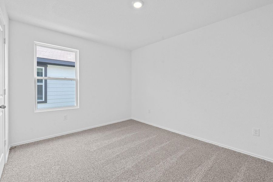 Empty room featuring carpet and recessed lighting Empty room featuring carpet and recessed lighting