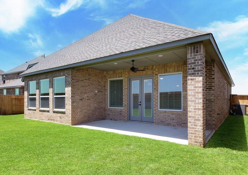 The covered outdoor living area provides the perfect place to relax at the end of the day.