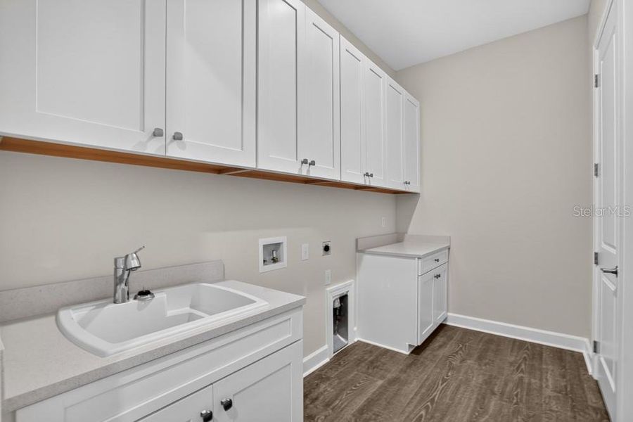 Furnished interior view inside a new home in Coasterra Community Group Page, Palmetto (Image 11).