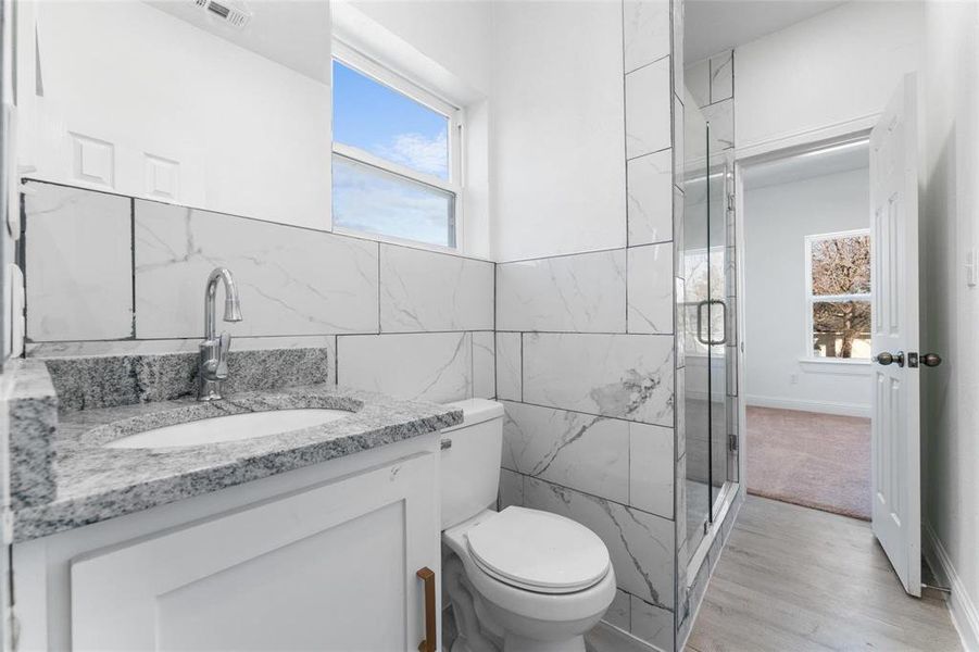 Furnished interior view inside a new home in , Dallas (Image 13).