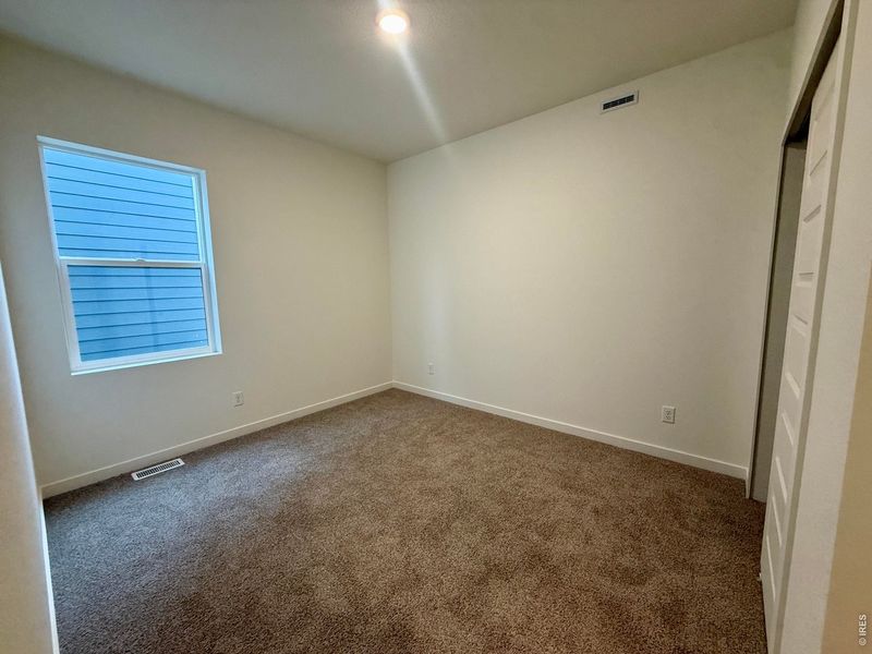 Spacious, unfurnished interior of a new home in Granary, Johnstown (Image 24).